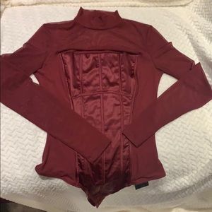 Cranberry/wine colored full body suit